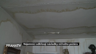 Nájemníci odklízejí následky ničivého požáru 